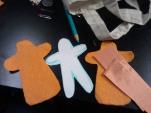 the cut out pieces of fabric to create the doll