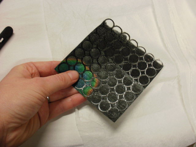 3D printing on liquid crystals on fabric.